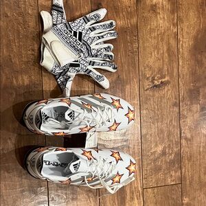 Adidas White Cleats with Orange Star Pattern and Graphic Gloves